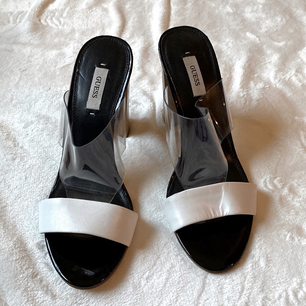 Women mules sandals black and  white with wood like heels.